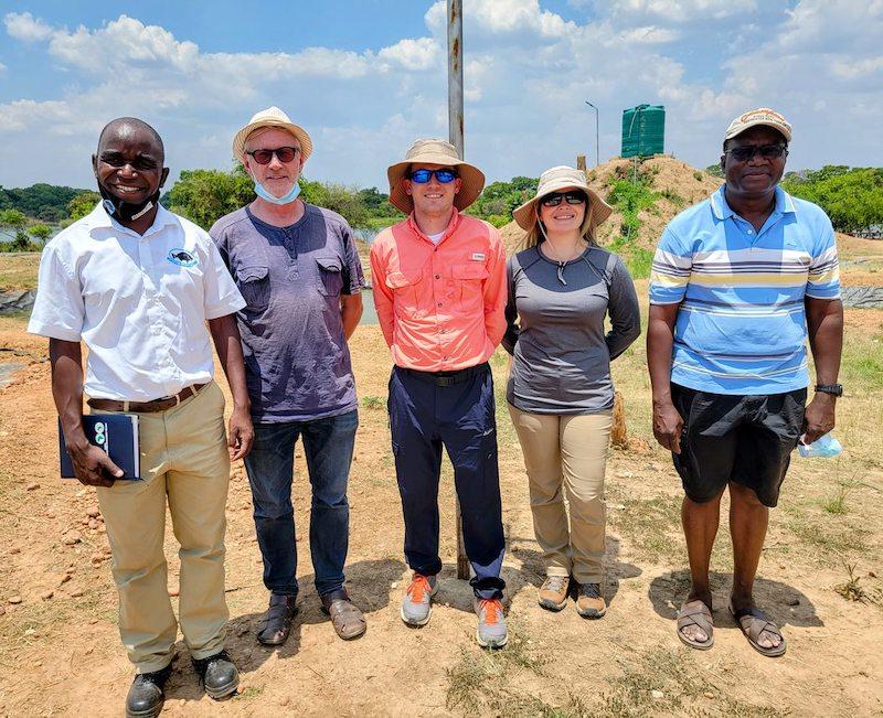 a group photo of five people